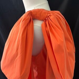 Orange bow cocktail dress